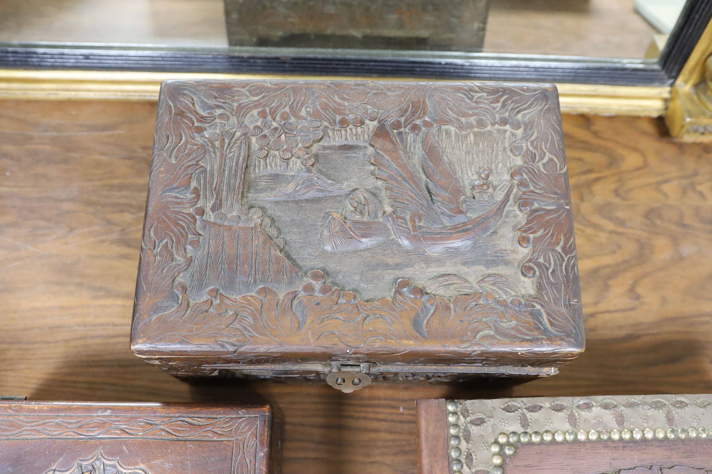 A Chinese carved camhor wood chest and three assorted boxes, Camphor chest 35 cms wide x22 cms high.